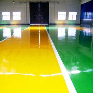 Durable two-component epoxy coating on concrete surface for corrosion protection.